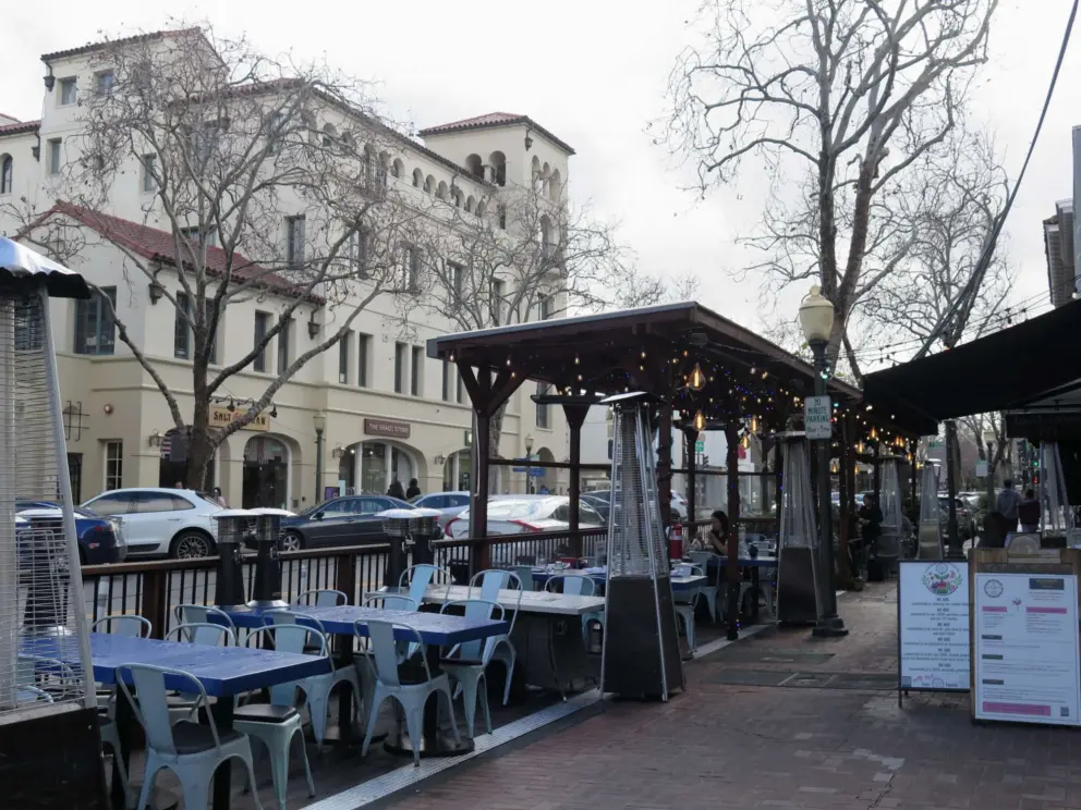 A restaurant with outdoor seating.