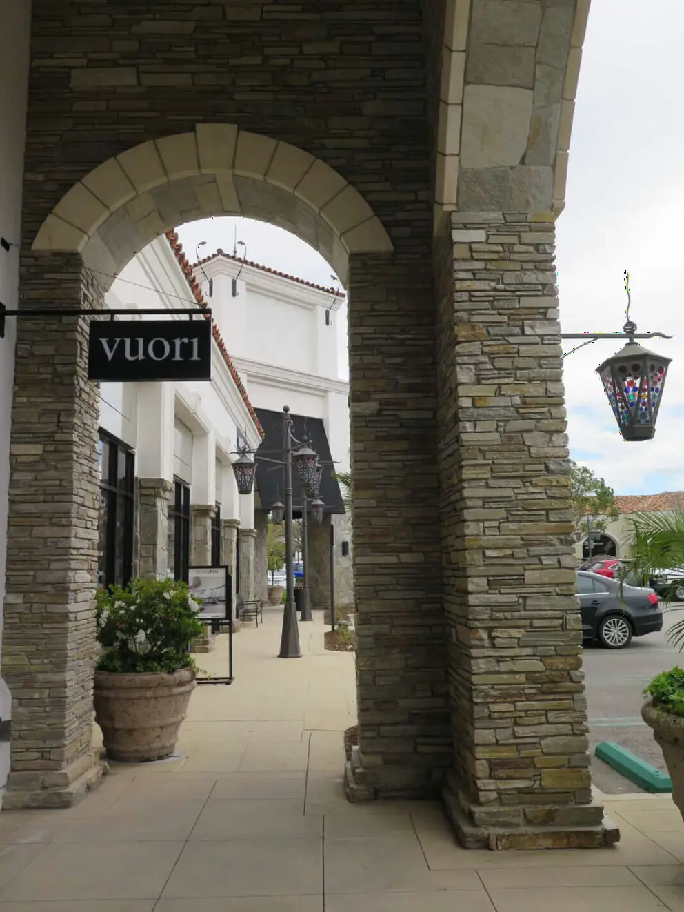 Stone columns and stained glass lantern. 