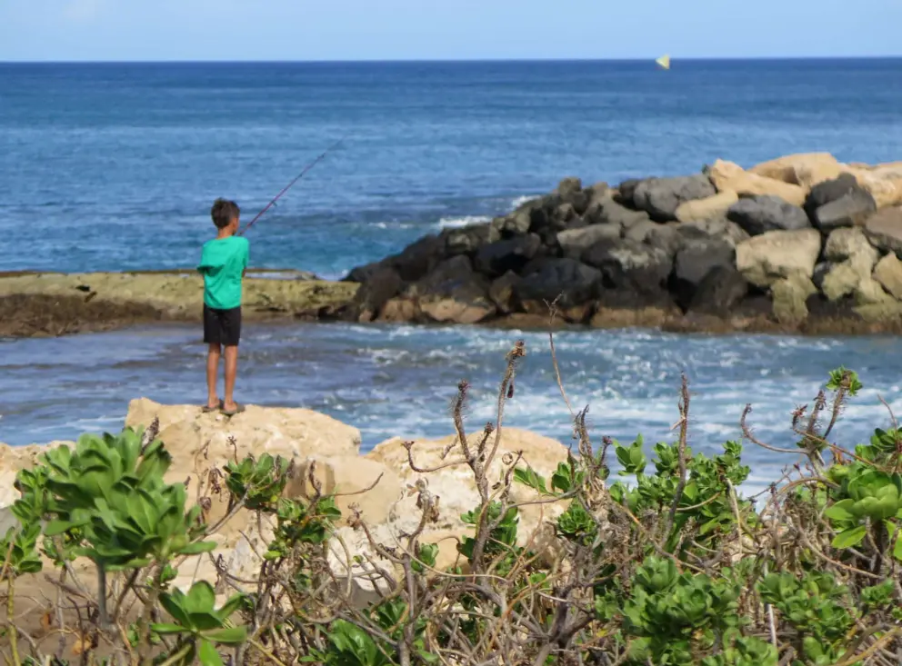 A boy fishing.