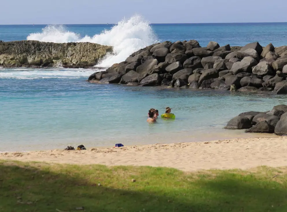 The rock walls keep the strong surf out of the lagoon. 