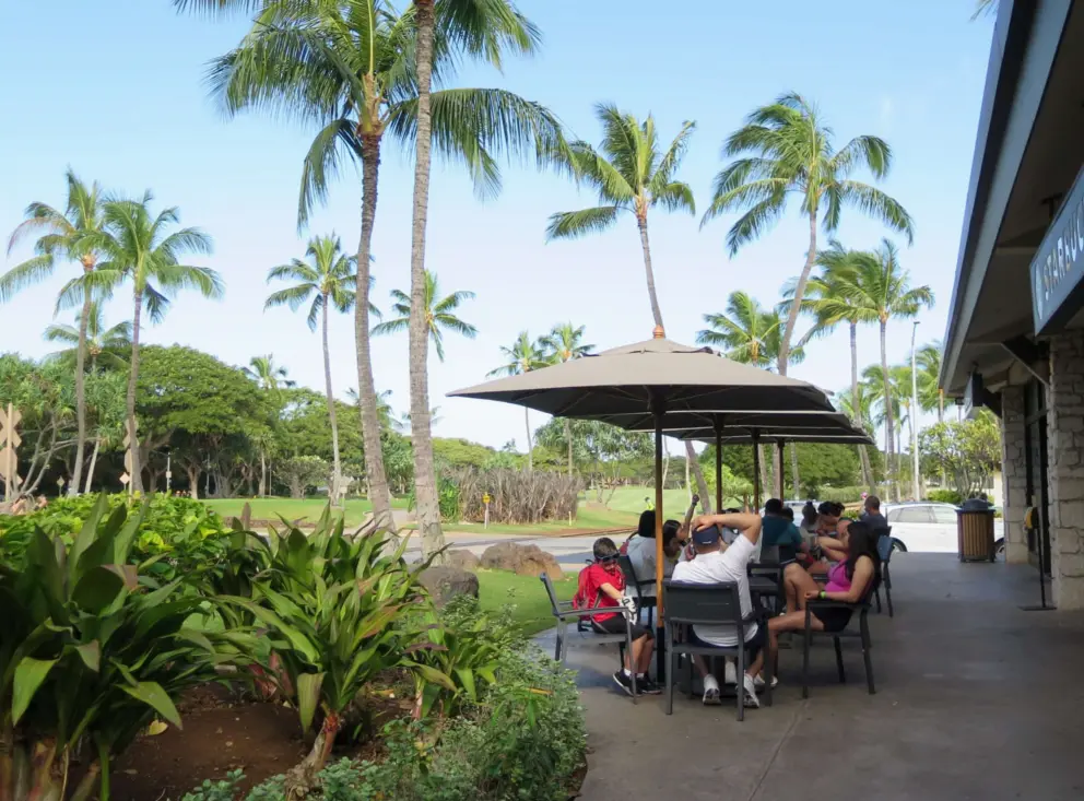 Sitting outside Starbucks, at the shopping area. 