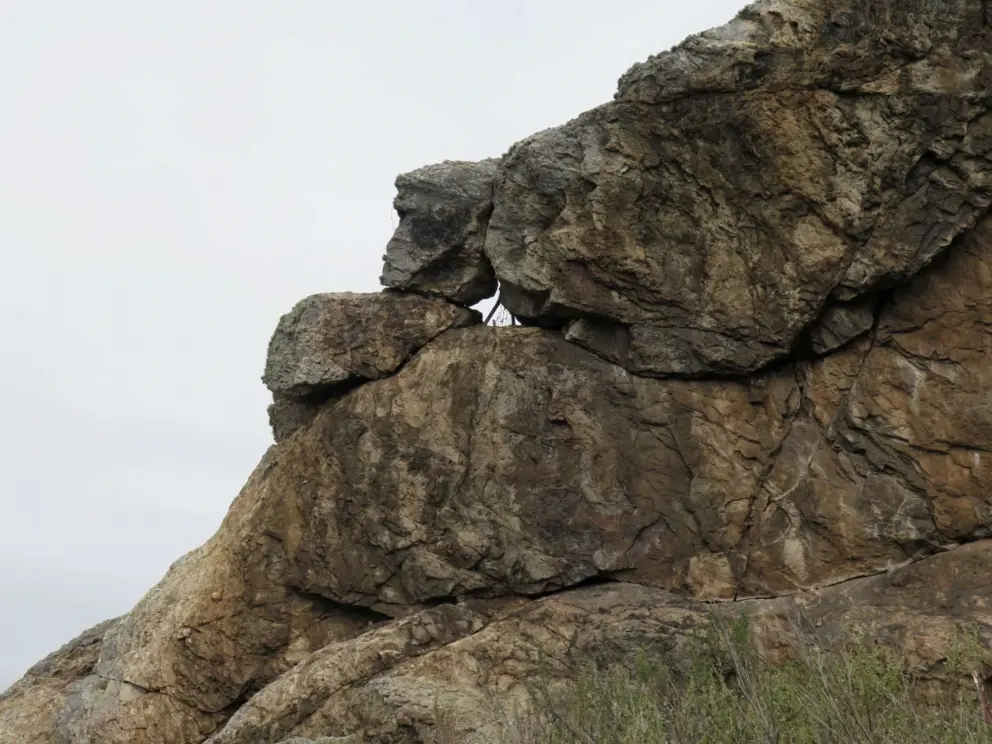 You can see through a hole in Eagle Rock. 