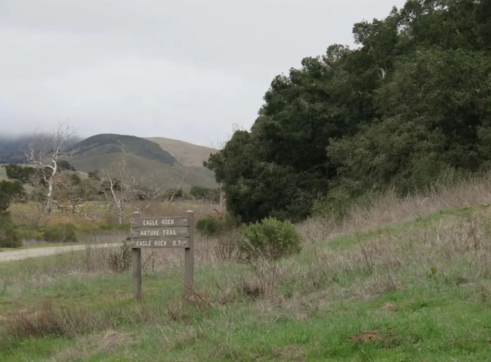 The sign where the narrow trail starts. 