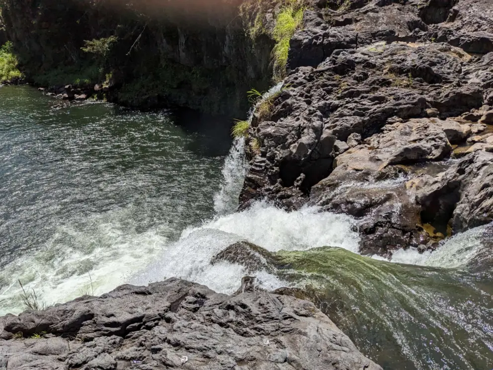 The water rushing over the waterfall at the end of the hike. 