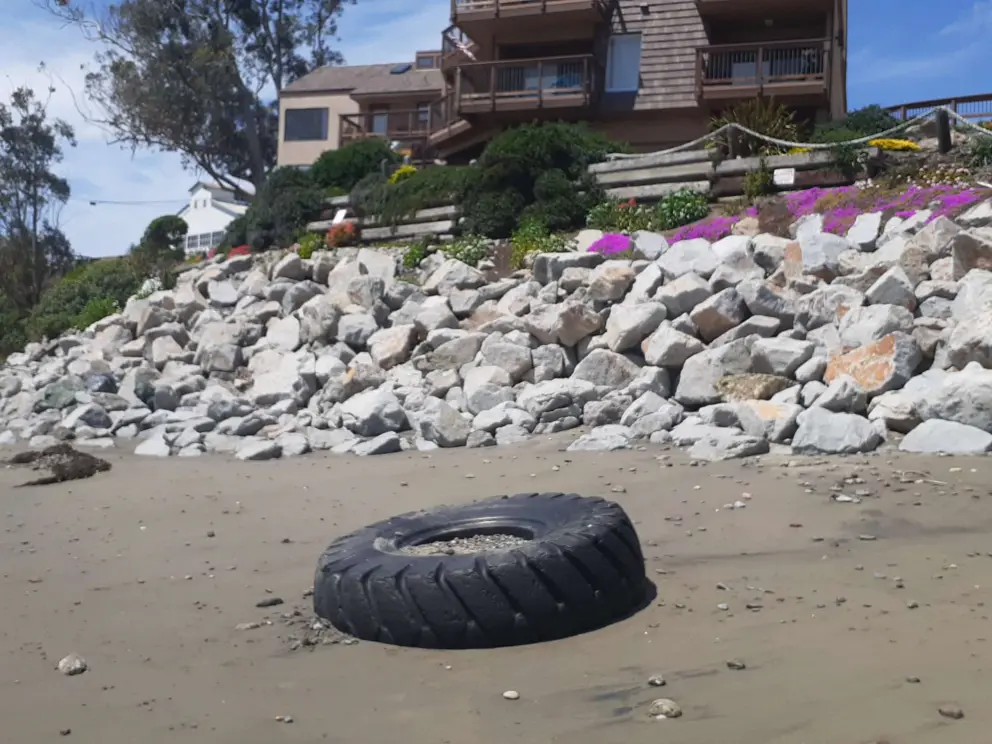 Tire on the beach. Kids enjoy jumping on it. 