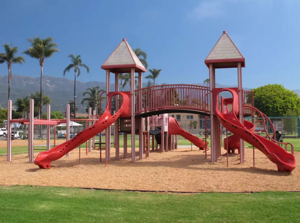 Playground on the corner of Walnut St and 6th St, just two blocks east of Linden Avenue.