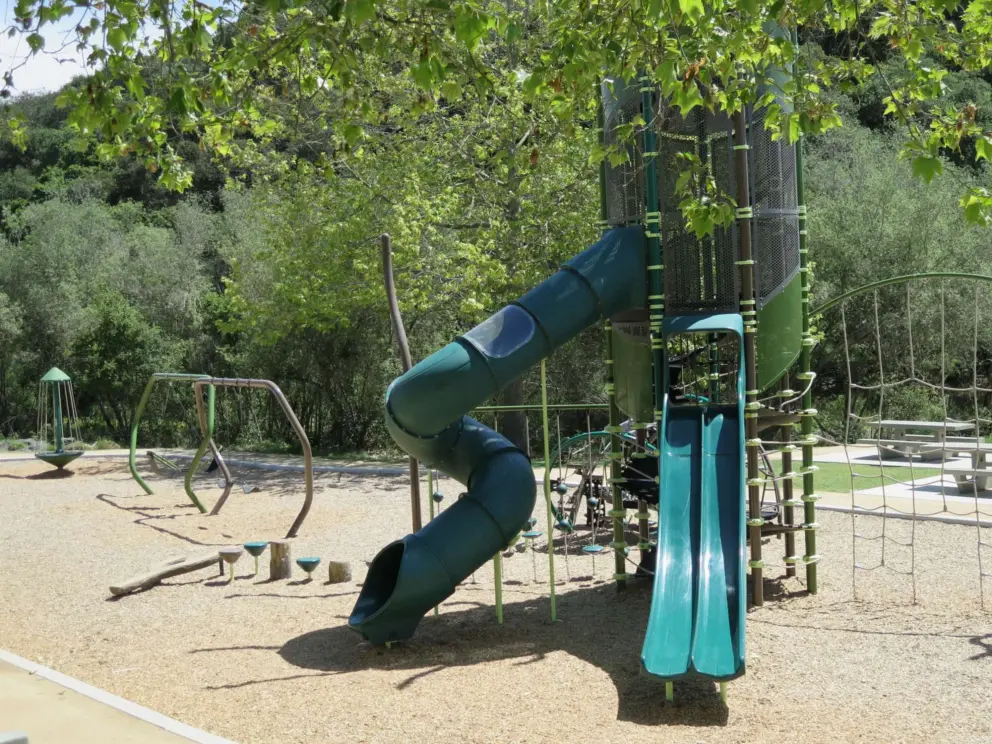 Double slides and tunnel twisty slide, plus ropes to climb. 