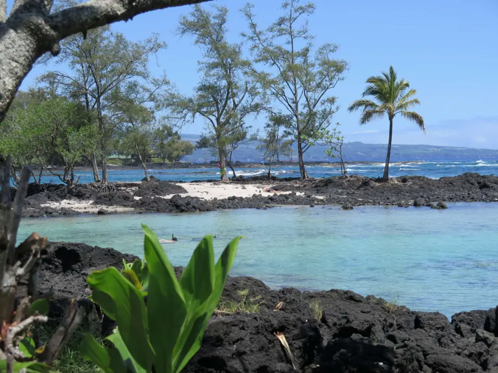 The rocky island you can swim to. 