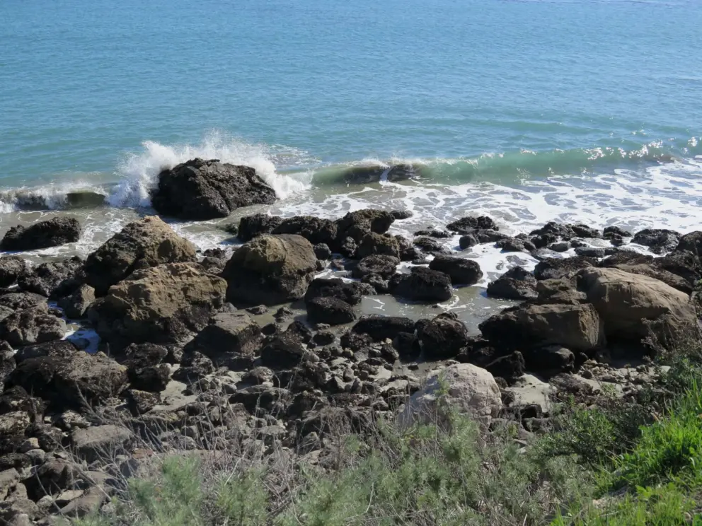 Waves crashing on the rocks. 