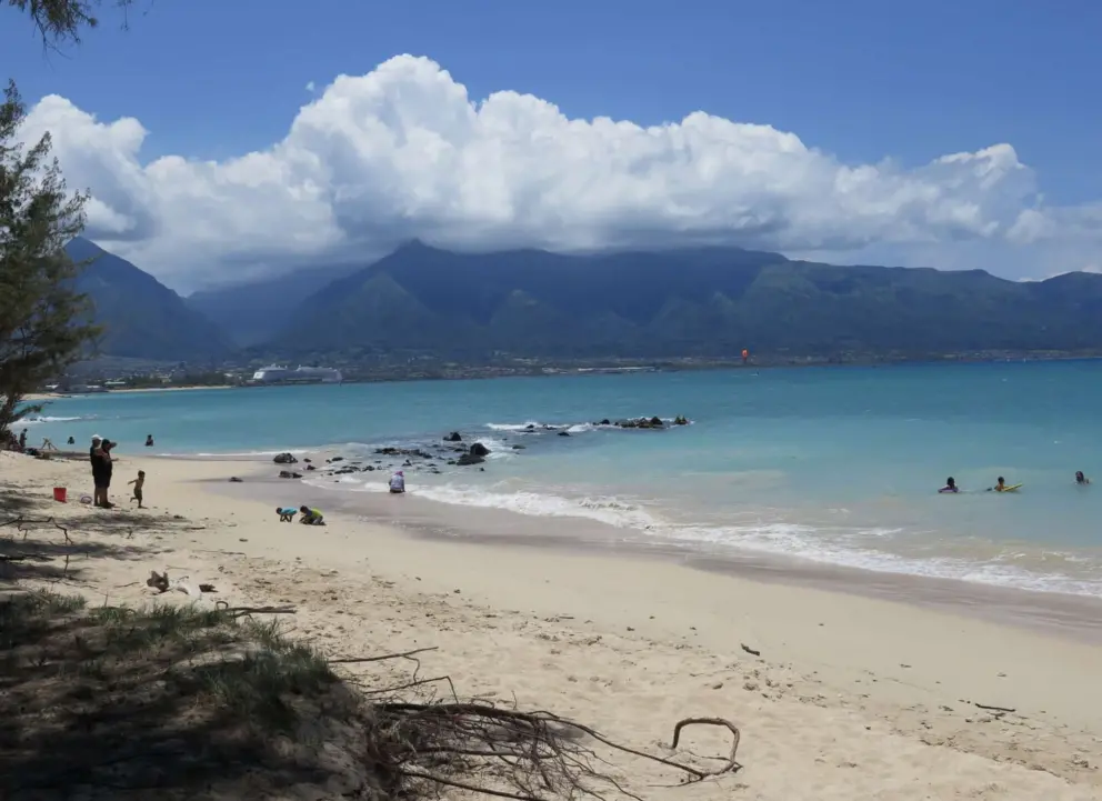 Clouds gathering over the mountains. I love the mountains at this beach!