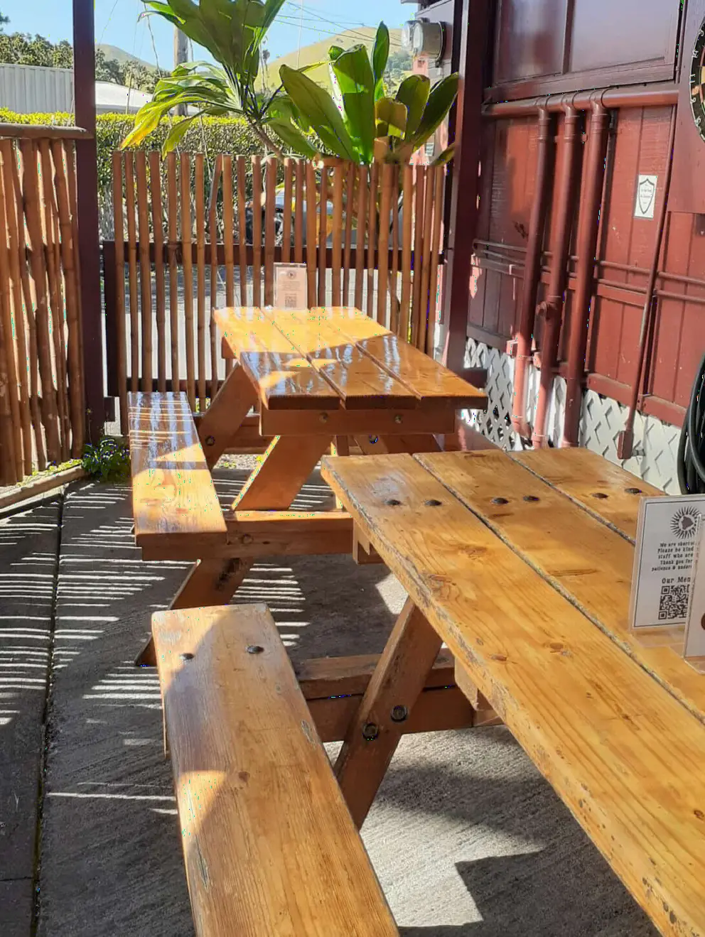 Picnic tables on the patio at Big Island Brewhaus. 