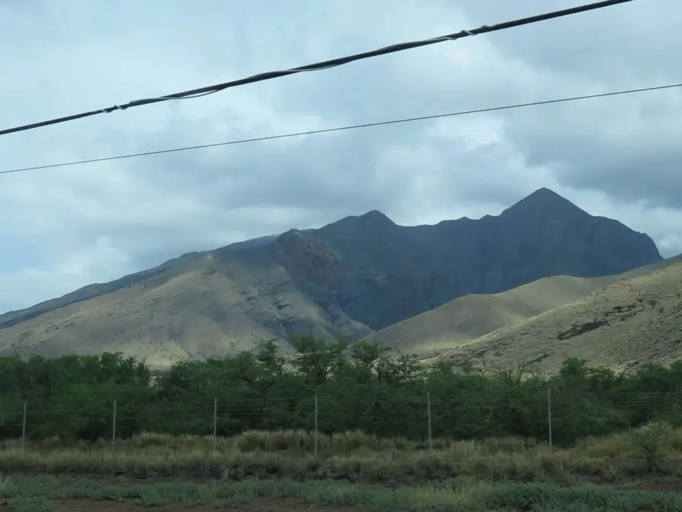 The shape of the mountains beside the road. 