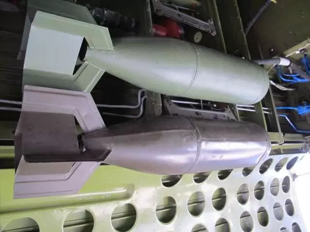 Standing under Executive Sweet and looking up at the bombs.