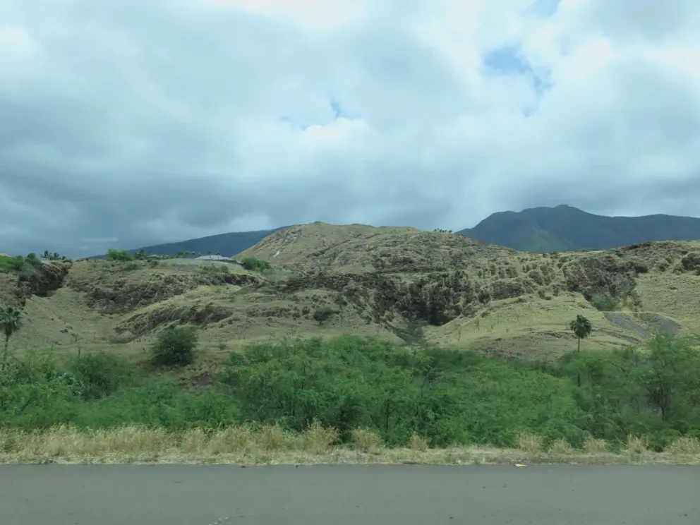 The mountains beside the road. 