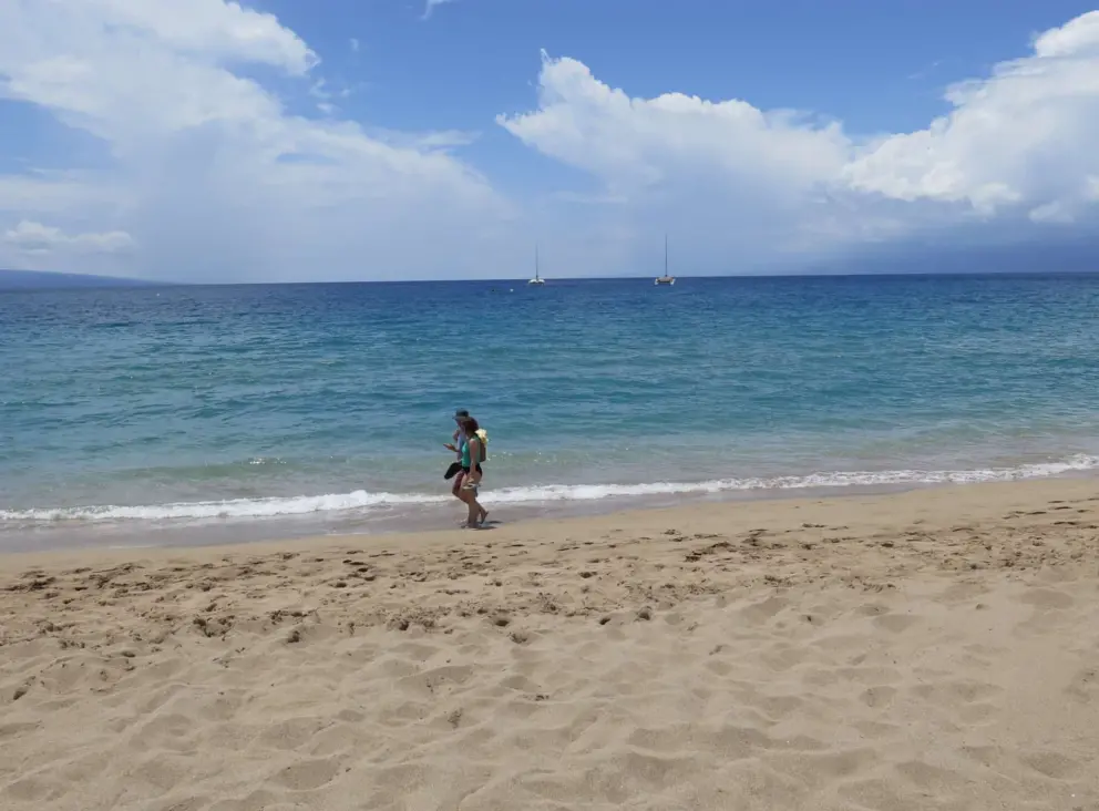 Walking along the shore of Kaanapali Beach. 
