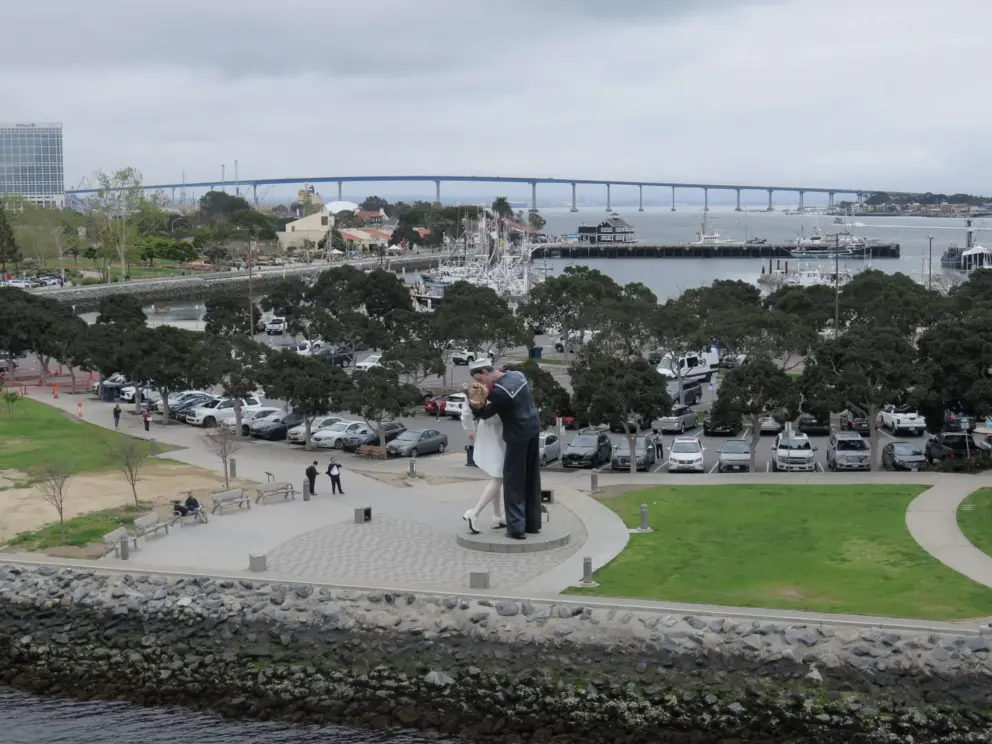 Unconditional Surrender sculpture at Tuna Harbor Park, with the Coronado Bridge in the distance. 