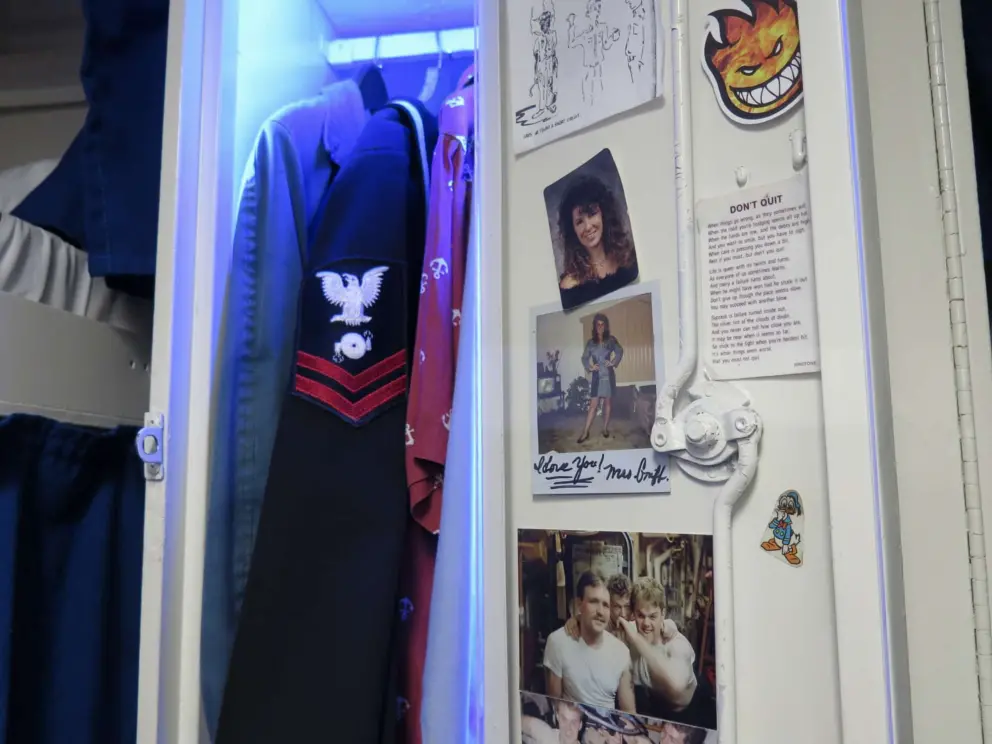 A crewmember's locker with a poem called Don't Quit. 