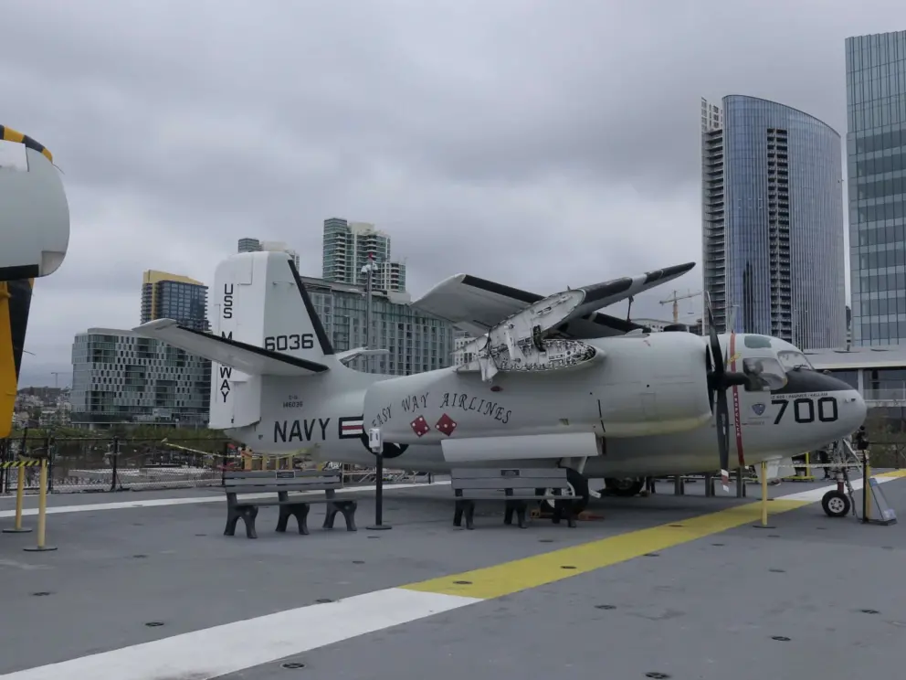 Planes with the city skyline in the background. 