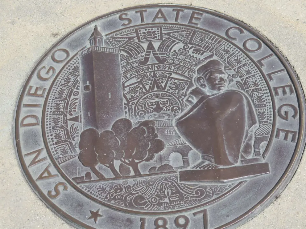 San Diego State College design in the sidewalk. 