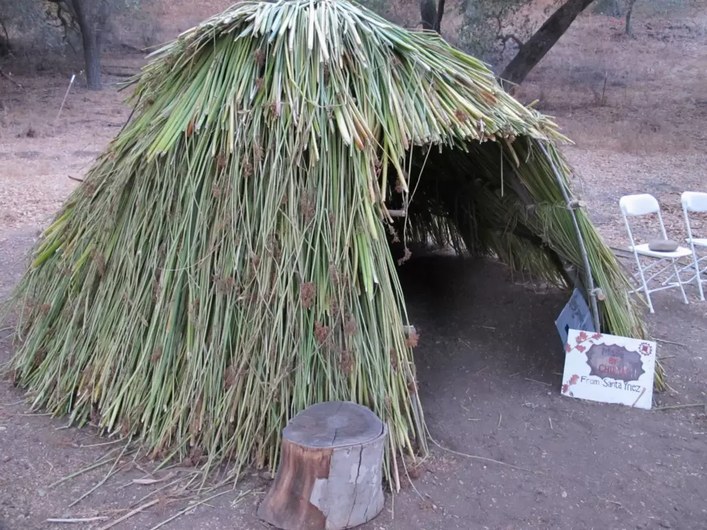 Chumash hut where kids can play and storytelling sessions take place during the day.