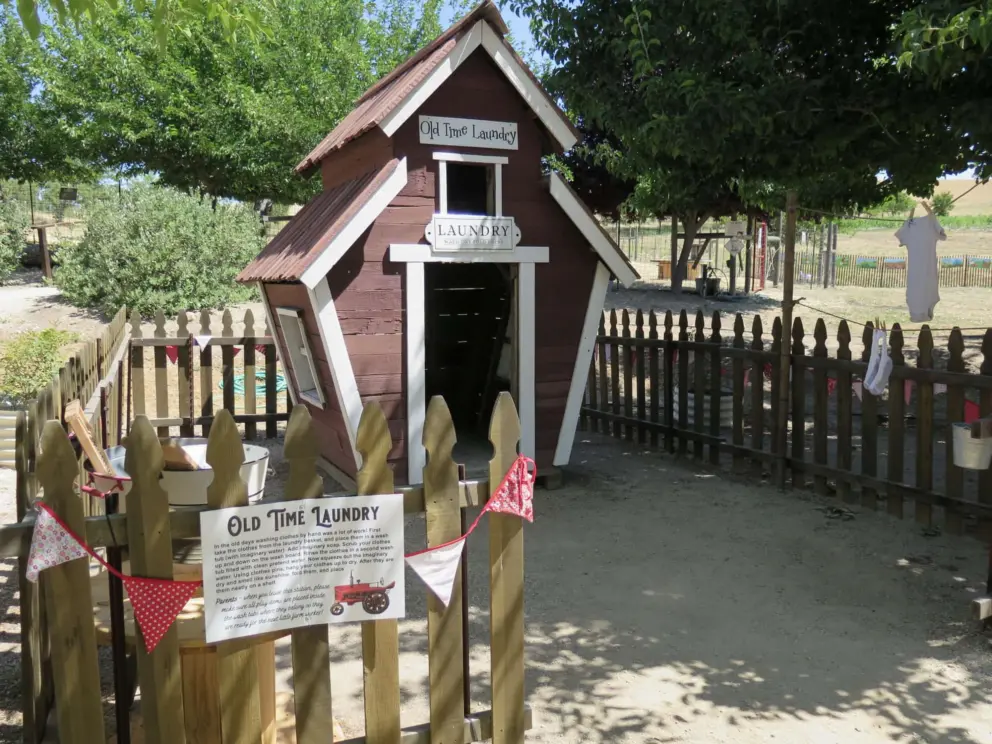 Old Time Laundry play area where you can use a washboard and then hang laundry to dry. 