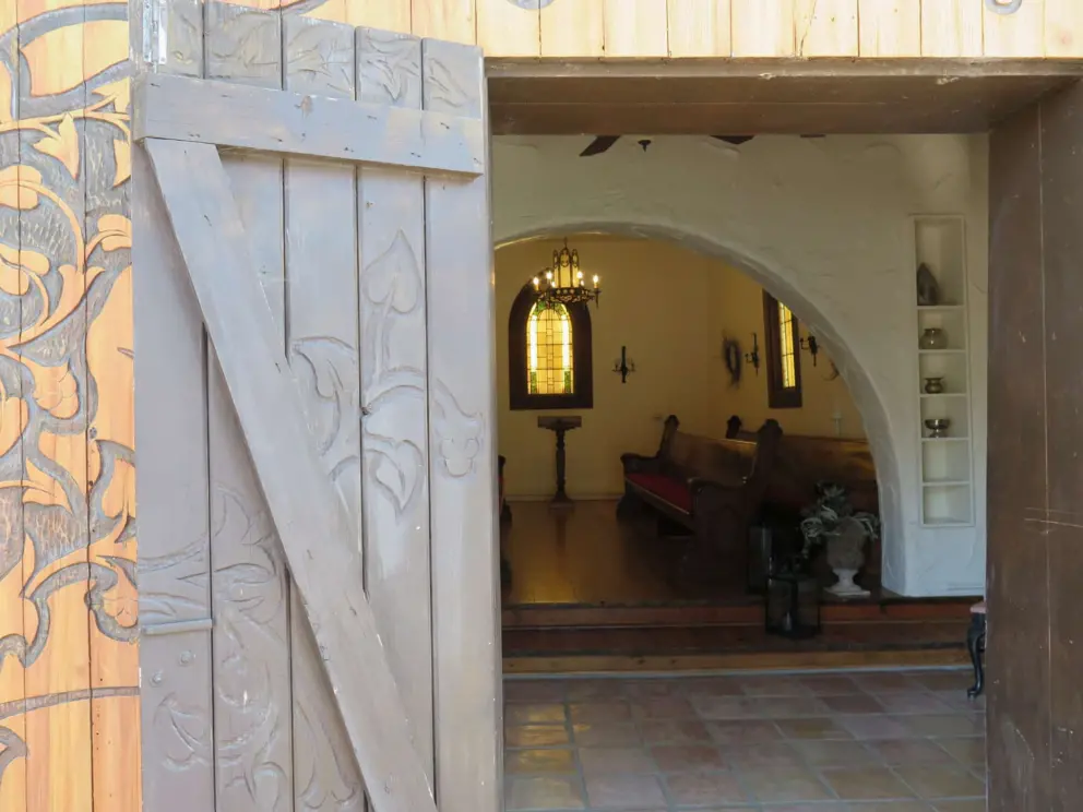 The wooden chapel door. 