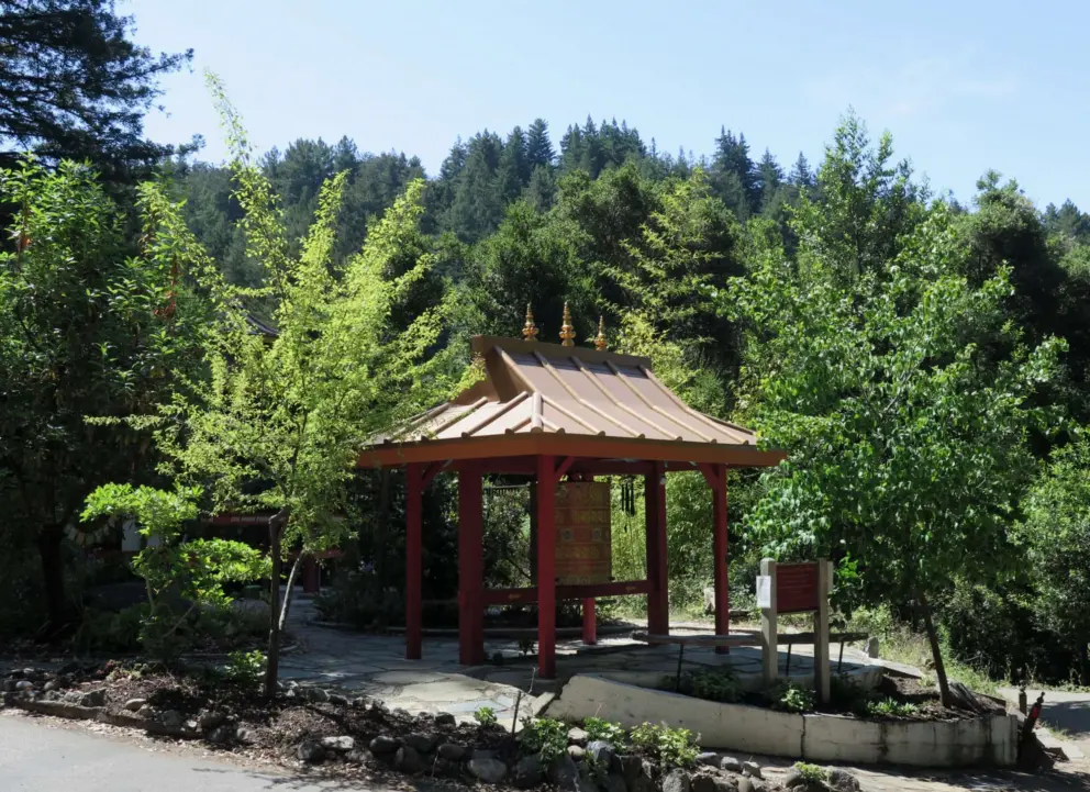 The third prayer wheel, at the second level. I love its golden roof so much, and the amazing treetops behind. 