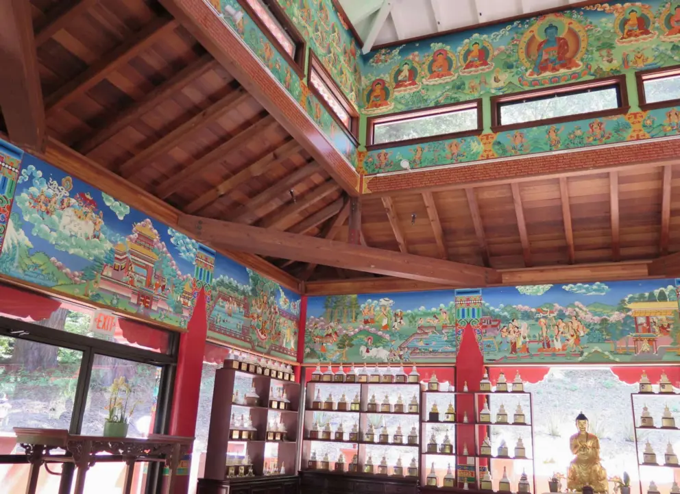 Painted scenes in the Wish Fulfilling Temple. 