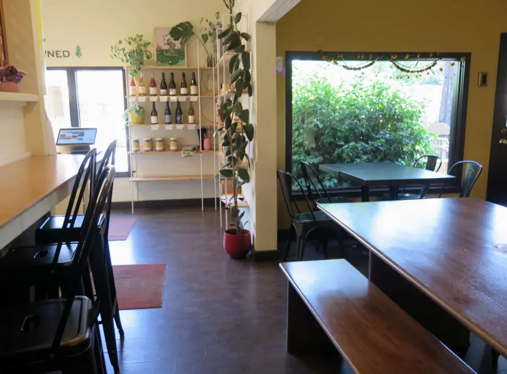 A cute table by the window in The Grove Bakery and Cafe. 