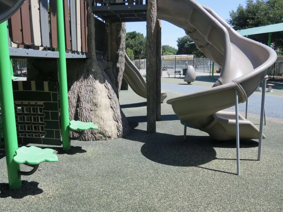 Twisty slide and leaf-shaped seats. 