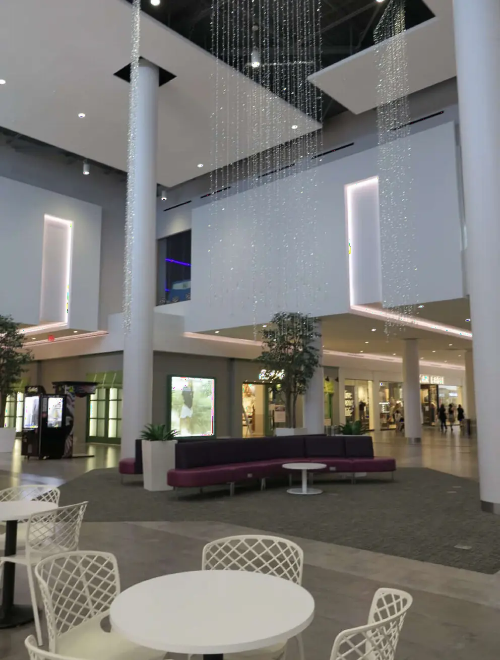 Tables and chairs, and decorative lights. 
