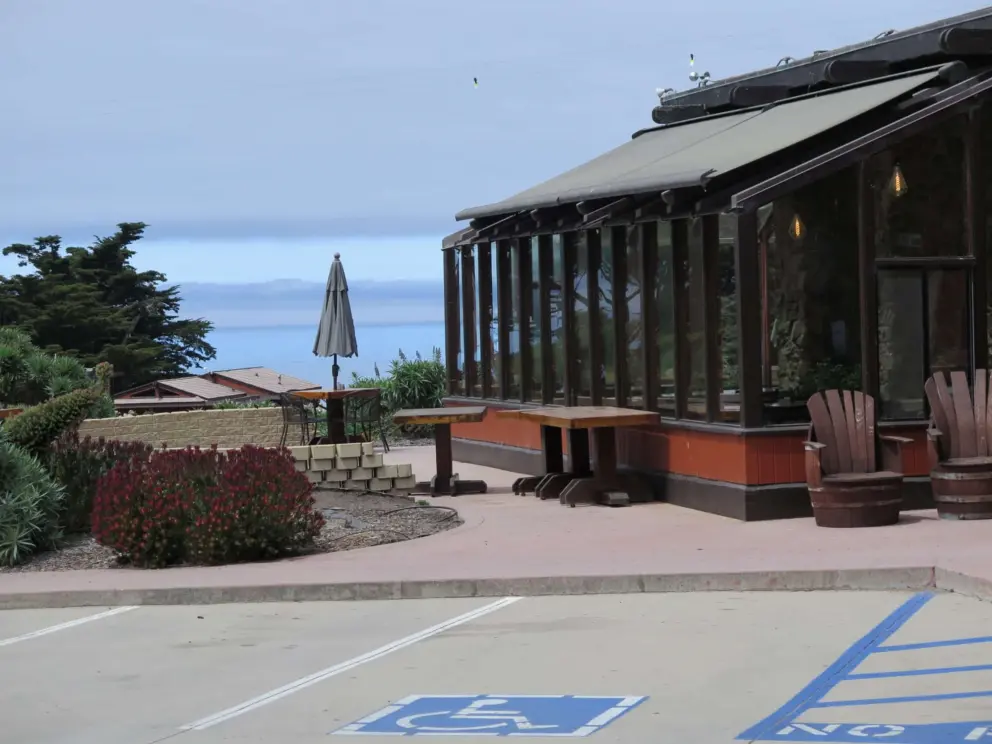The restaurant and the sea in the distance. 