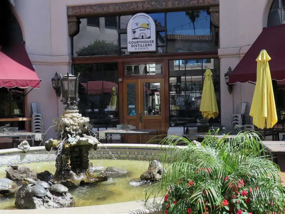 Courthouse Distillery, by the fountain.
