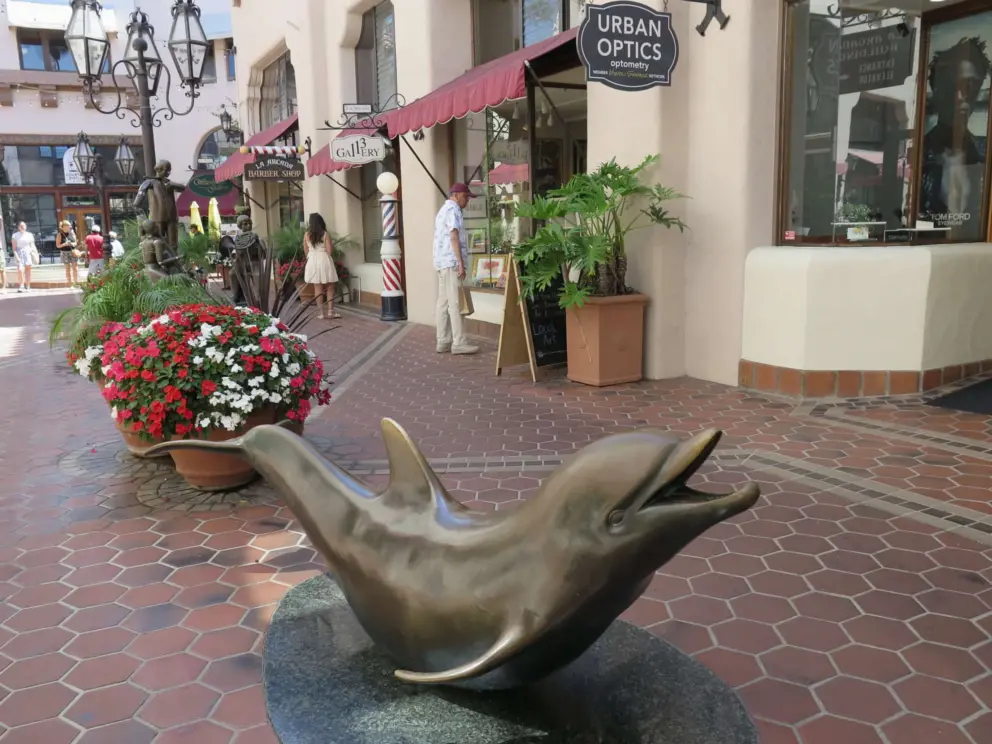 Dolphin sculpture that kids love to play on. 