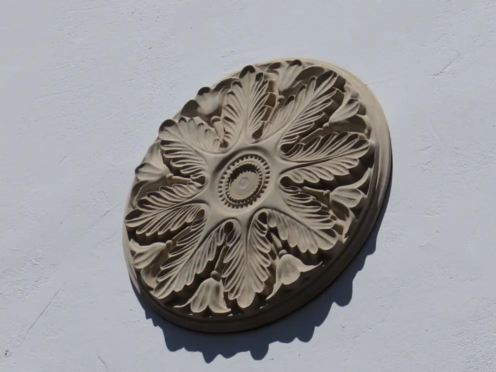 Plaster medallion on a wall. 