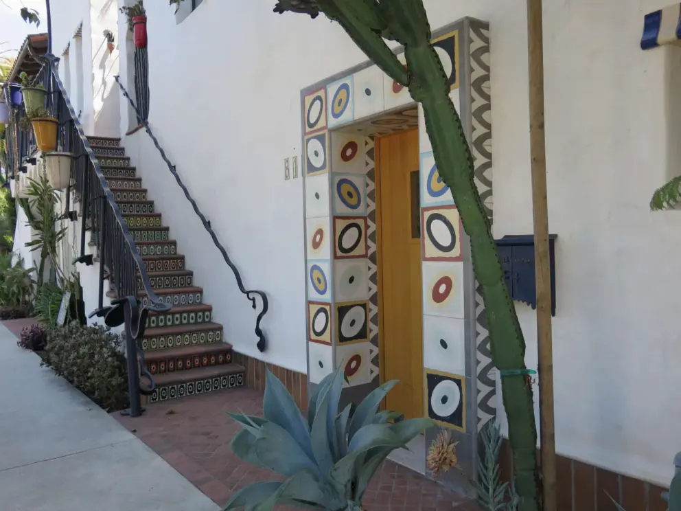 Playful doorway and staircase at El Jardin apartments. 