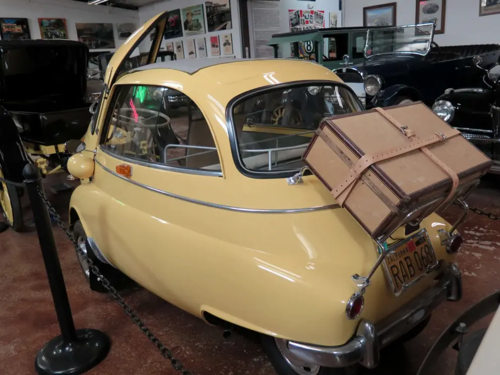 BMW Isetta 300, built 1957. I like the suitcase on the back! BMW wanted to save their struggling company with this economy car, licensed from an Italian manufacturer. 
