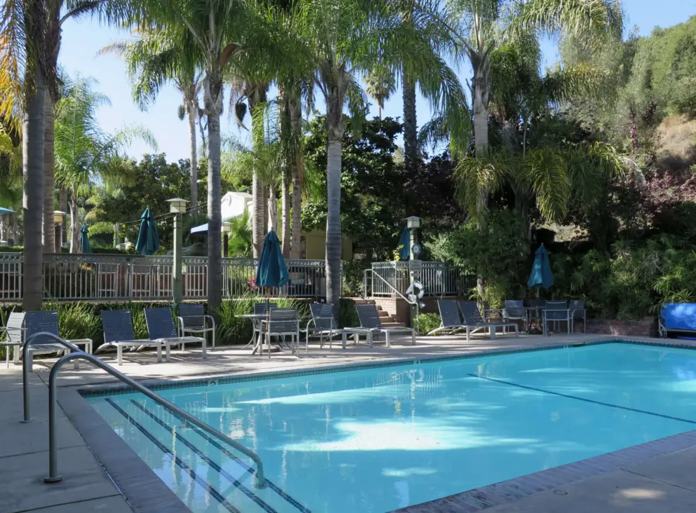 Quiet and shady side pool at Avila Bay Athletic Club. You can buy food and eat it here even if you're not a member. 