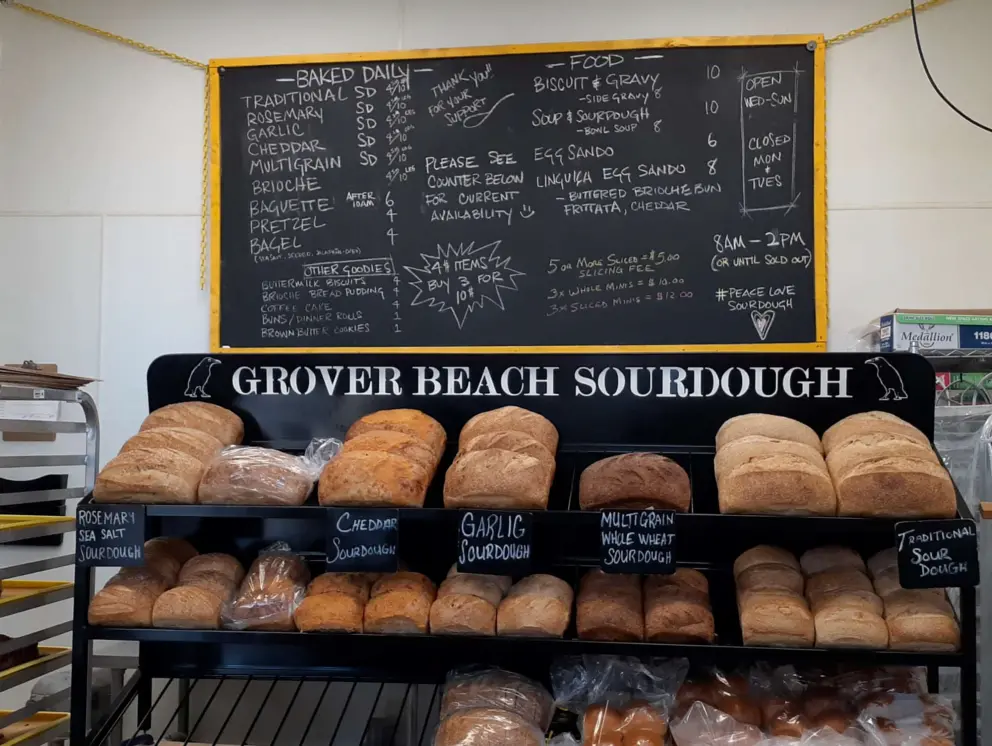 The yummy offerings at Grover Beach Sourdough: Rosemary, Cheddar, Garlic, Whole Wheat, and Traditional, plus muffins, bagels, pretzels, biscuits.