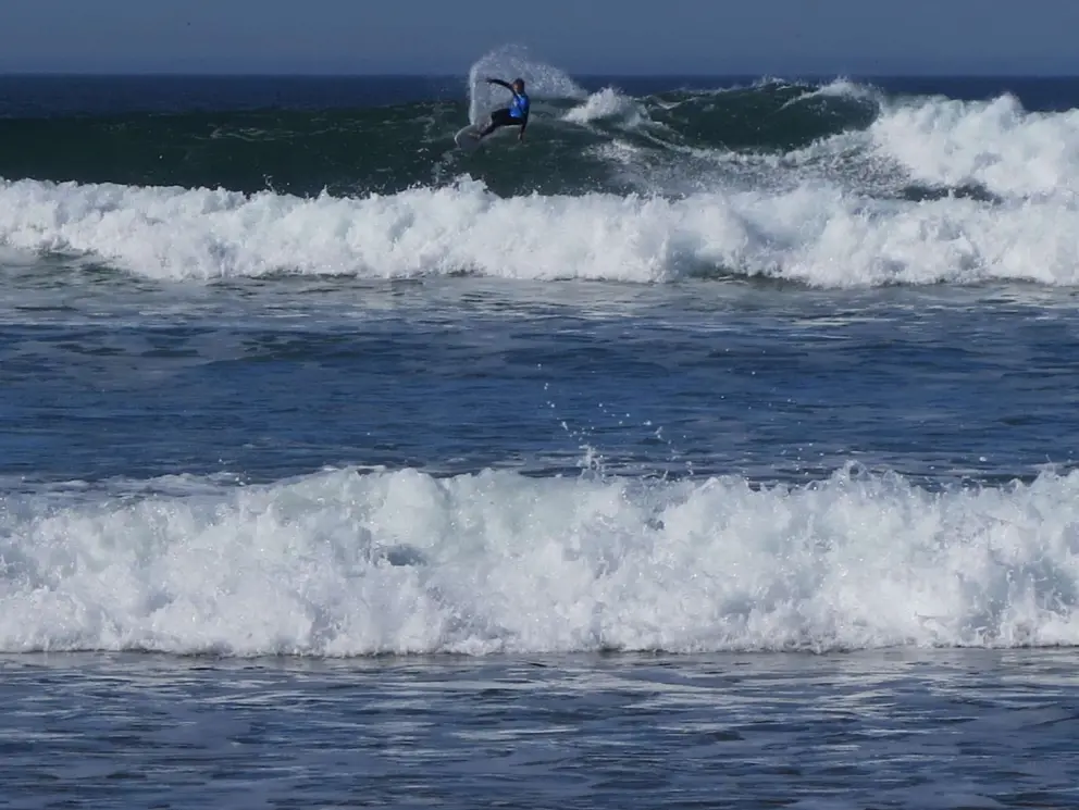 Surfer throwing some spray at the SLO CAL Surf Contest.