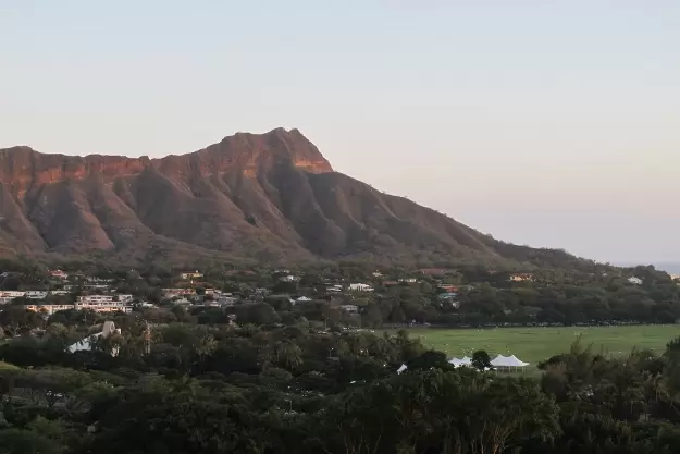Kapiolani Park sits below the perfect curve of Diamond Head. Shot taken from Park Shore Waikiki Hotel.