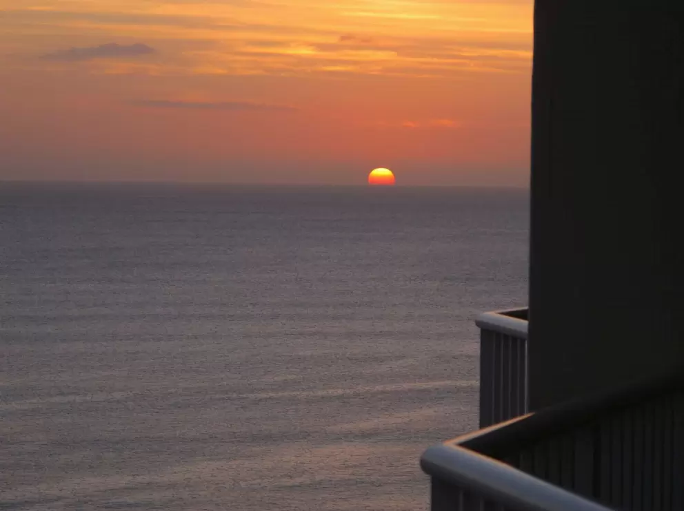 Sunset over the water, seen from Park Shore Waikiki Hotel room.