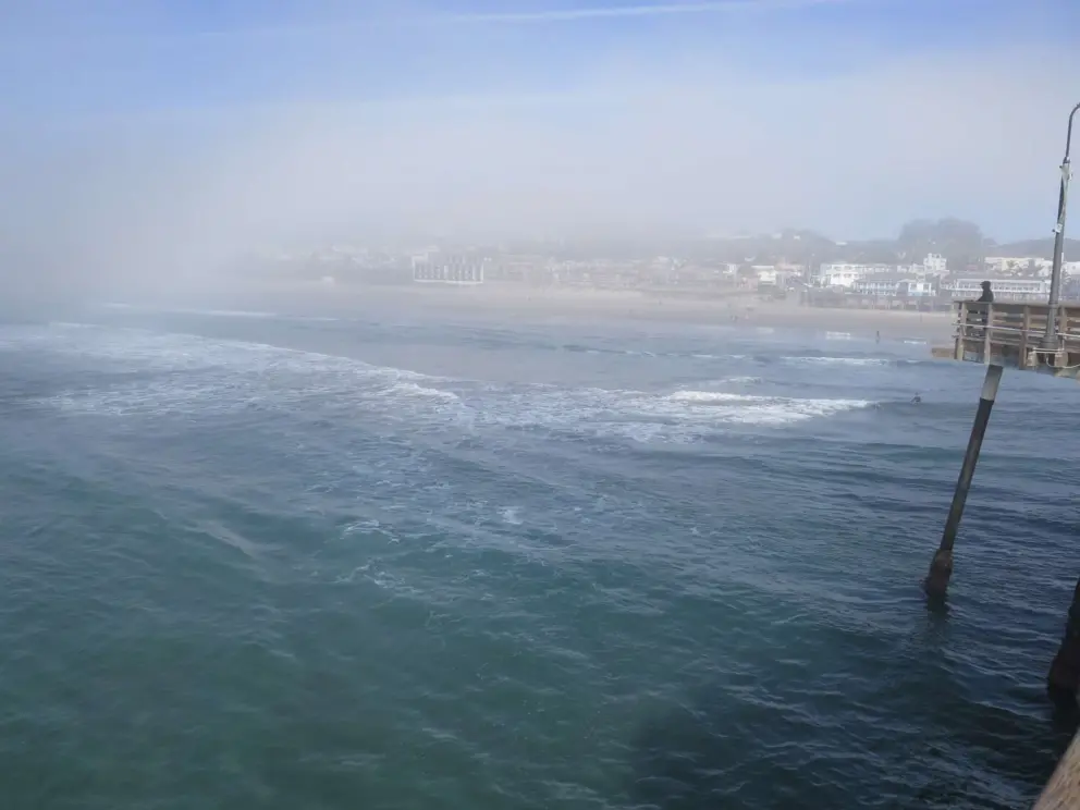 A second ago it was clear skies and sunshine, and now the fog has covered the beach!