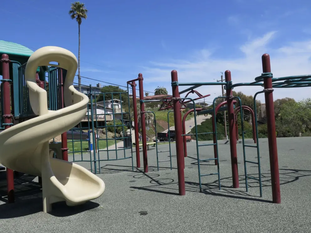 Twisty slide and monkey bars galore!