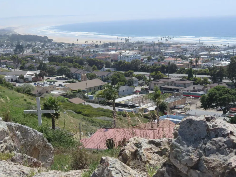Cross near the lookout, and view of the Oceano Dunes making lots of sand in the air!