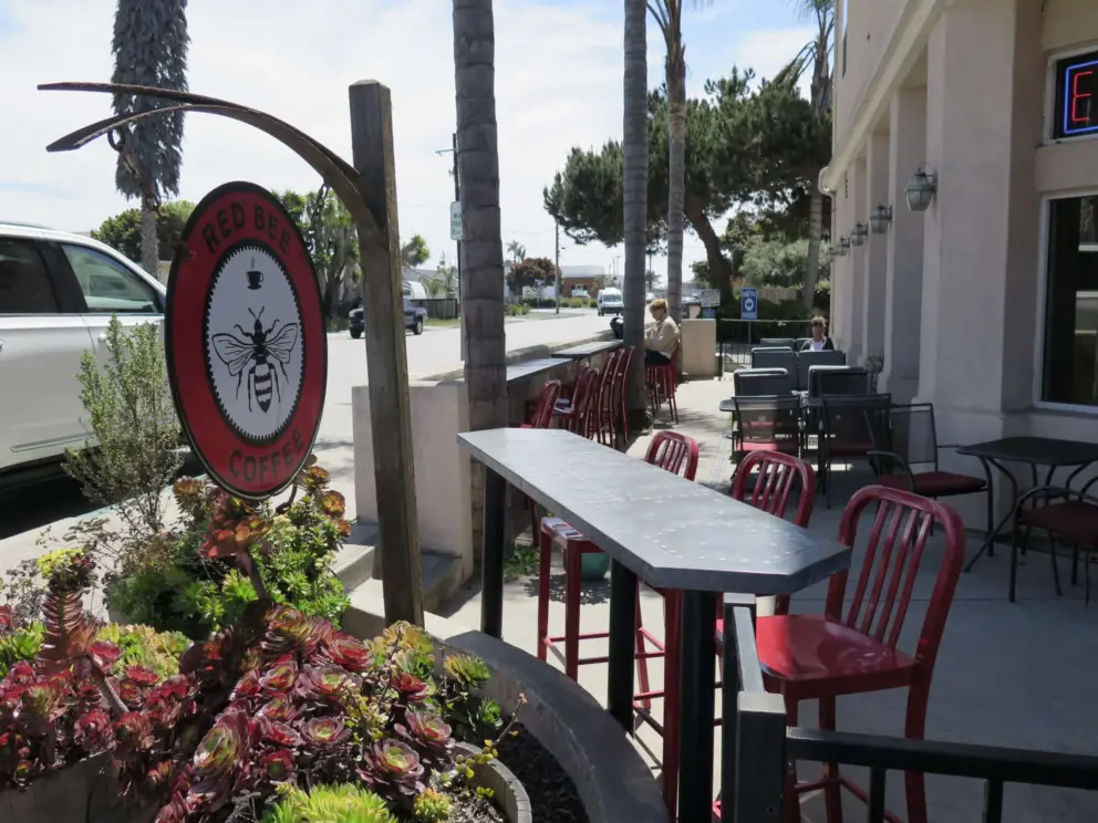 Tables outside Red Bee Coffee. 