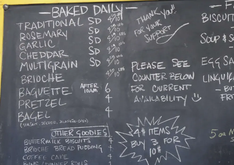 Menu board at Grover Beach Sourdough. The cheddar sourdough bread is really good!