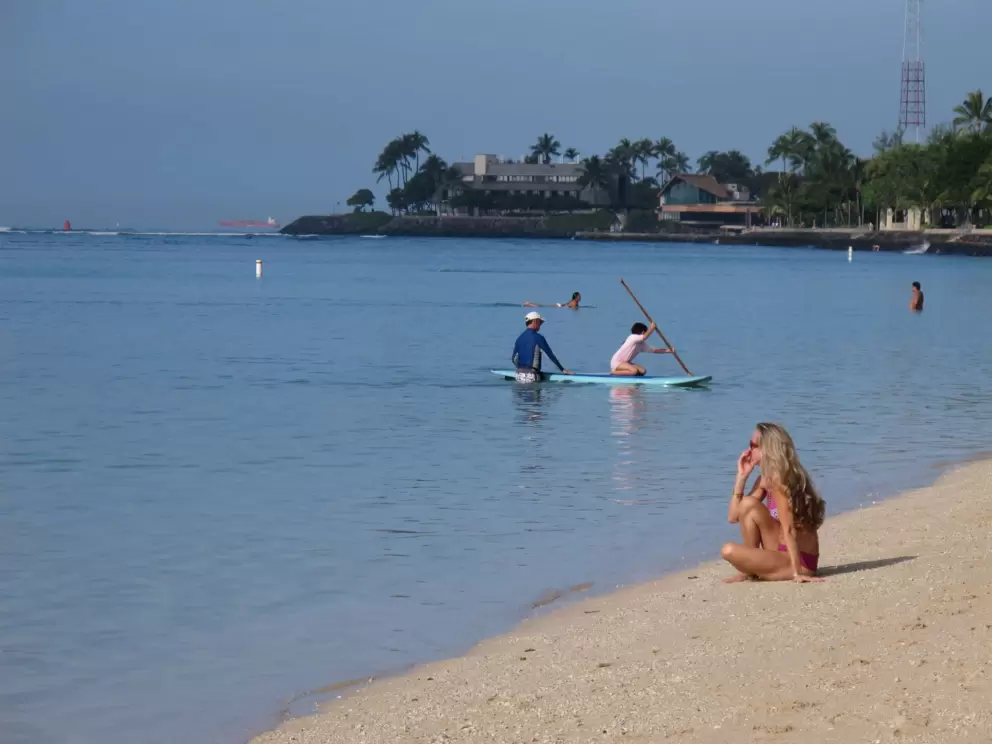 Young woman taking a break on the beach.