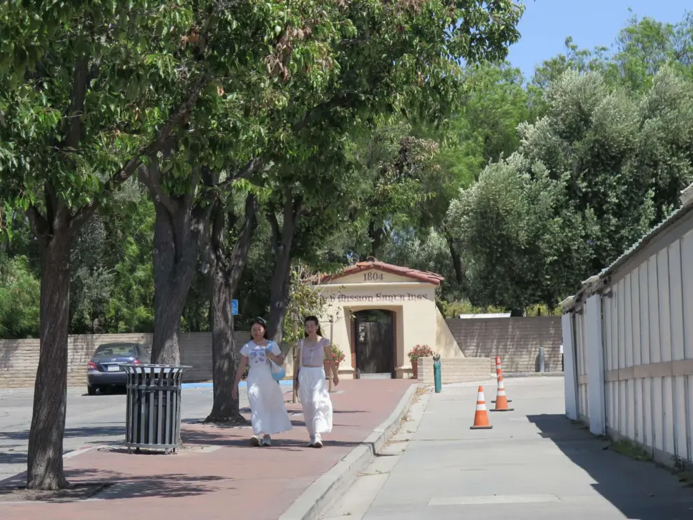 The arch the leads from the shops and cafes of Solvang, into Mission Santa Ines, on Alisal Rd. 