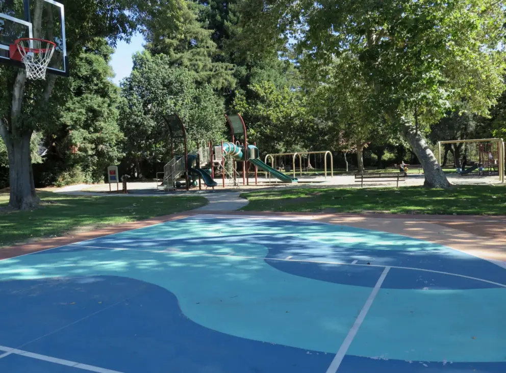 I like how the basketball court is painted! It is near the playground, which is handy in case you have kids on both. 